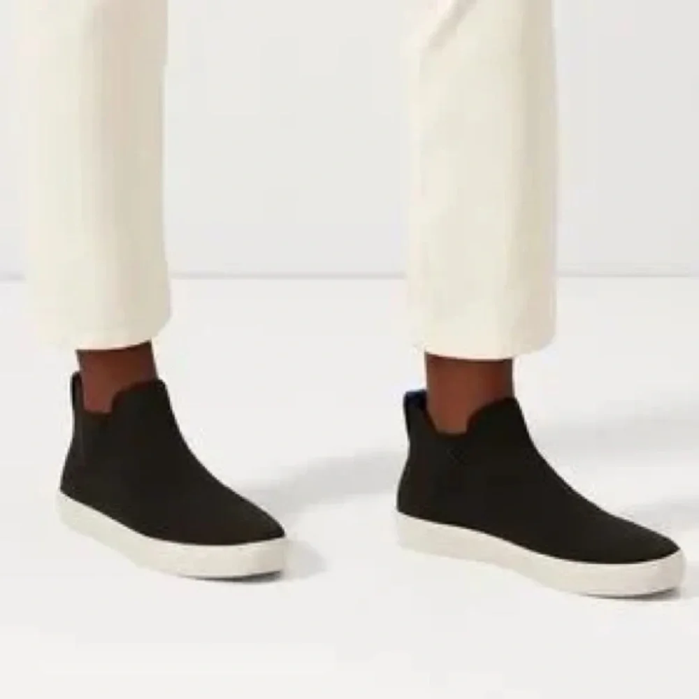 Rothy’s The Chelsea Slip On High Top Sneakers in Black